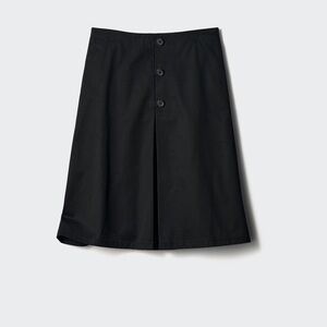 Knee length black skirt